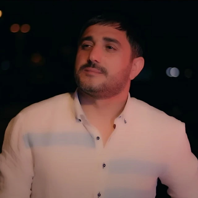 دانلود آهنگ Qara Gözlər از Vusal Bilesuvarli